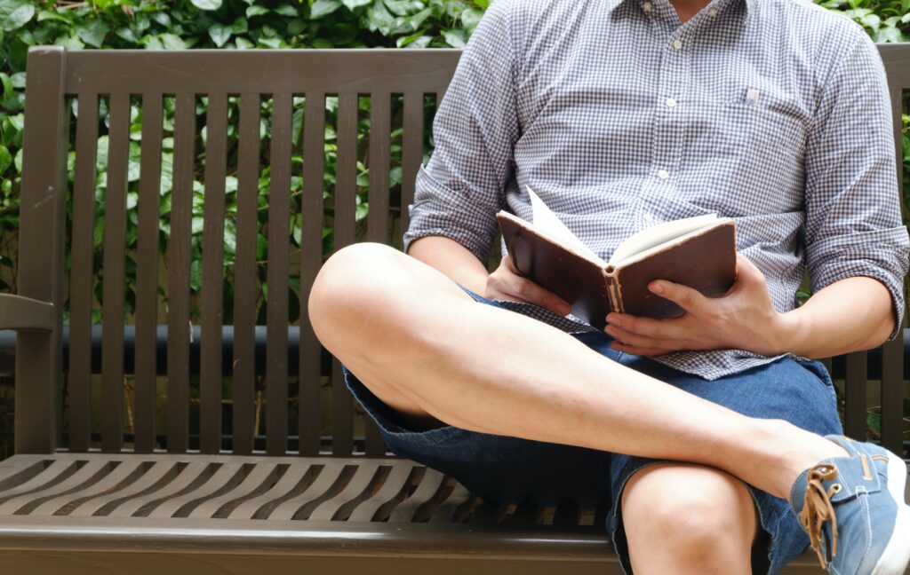 man reading book, research testosterone levels, men's health